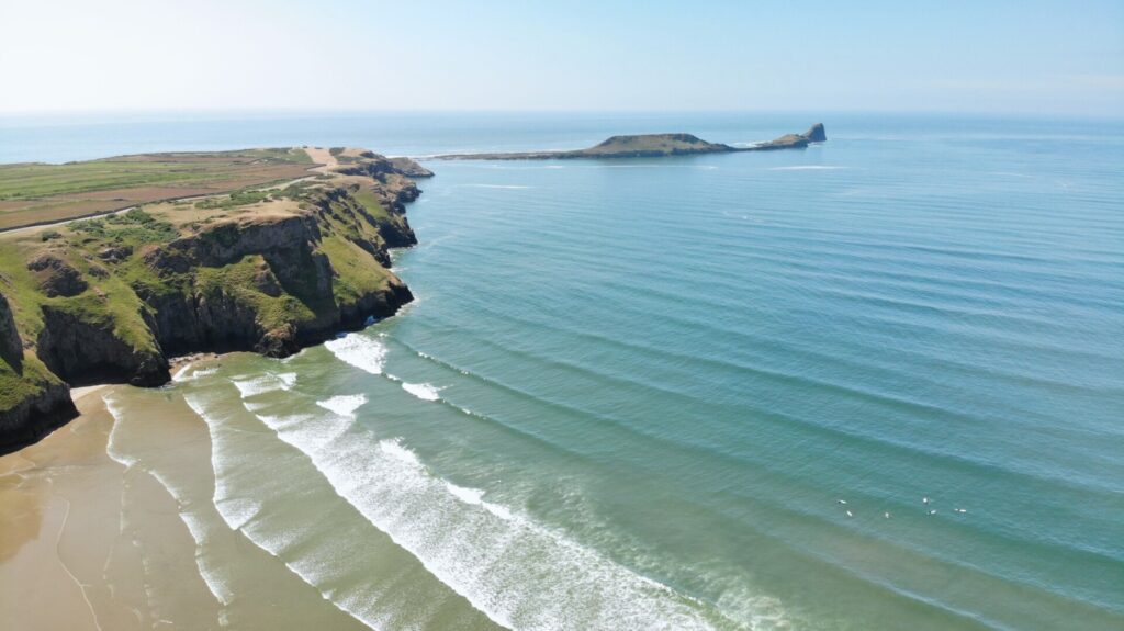 Views on Rhossili bay in Gower Swansea, perfect for group adventure travel and company offsites
