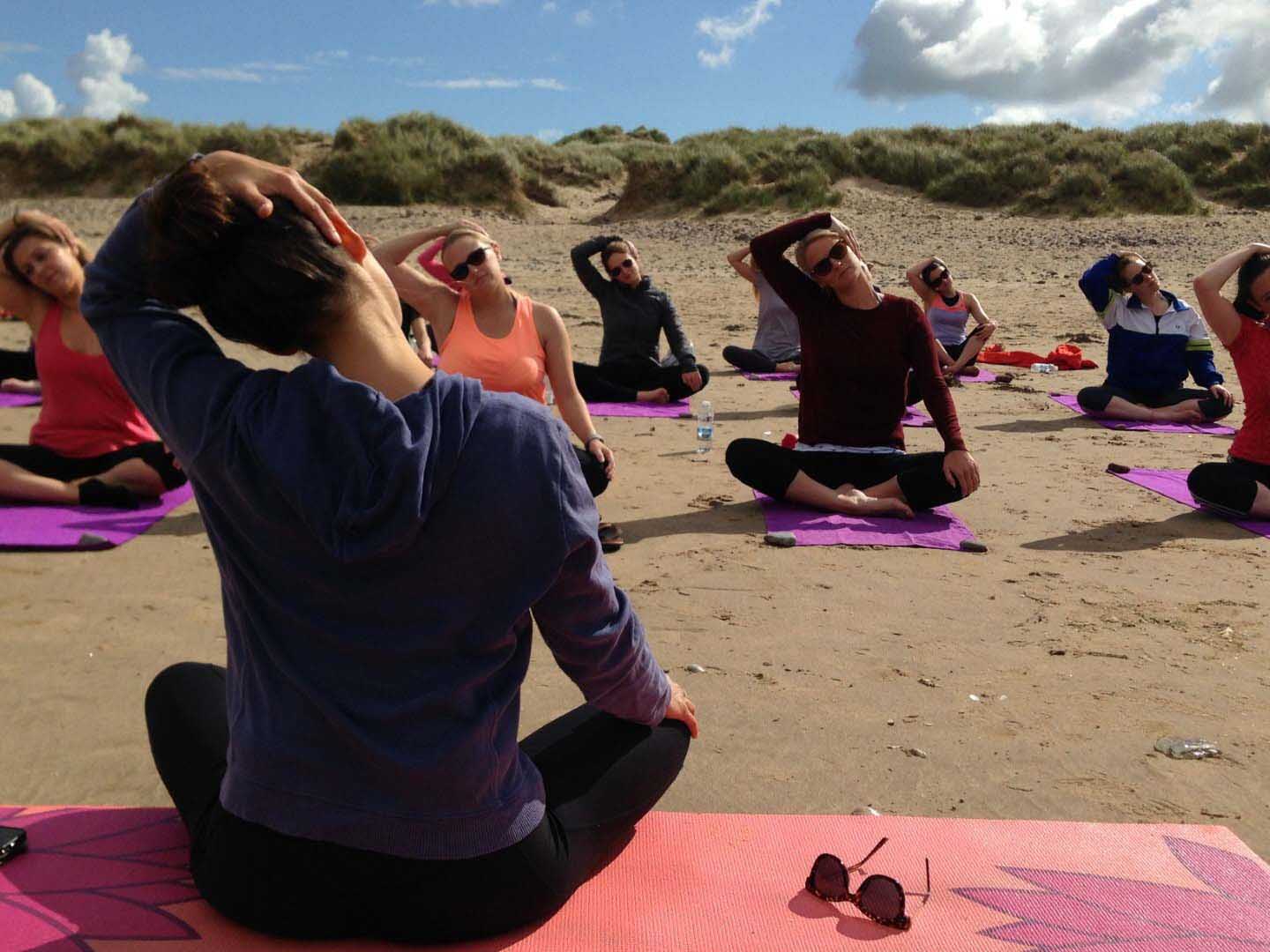5 Reasons Why Beach Yoga Is The Perfect Addition To Any Corporate Retreat